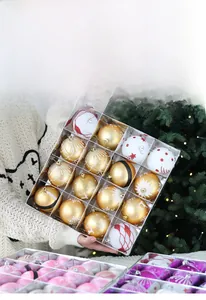 Detail of Christmas tree ornaments kit featuring glitter and patterned festive balls
