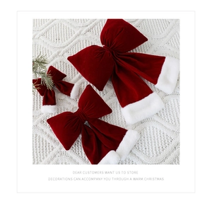 Lot de trois nœuds de Noël en velours rouge avec bordure en fausse fourrure blanche