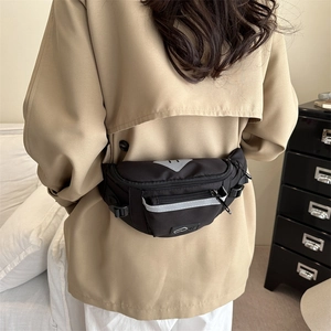 Versatile black nylon saddle waist bag with reflective strips for stylish night safety
