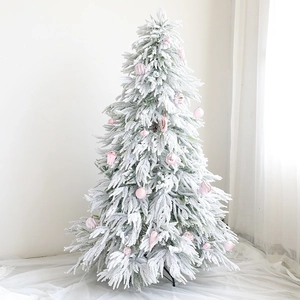 Lush 1.8m snow-flocked PE Christmas tree with elegant pink ornaments and minimalist design