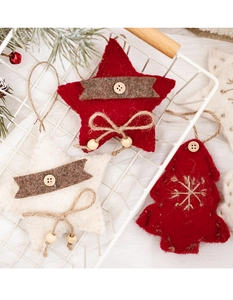 Detail of Christmas wool felt ornaments with wooden buttons and rustic hemp twine strings