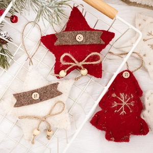 Handmade Christmas wool felt star and tree ornaments with wooden beads and jute twine