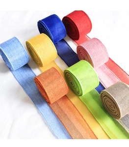 Detail showing various colors of woven faux linen ribbons with textured mesh patterns