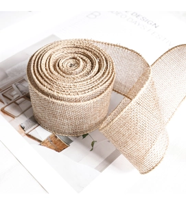 Detail shot of natural burlap ribbon roll for Easter crafts and rustic gift wrapping