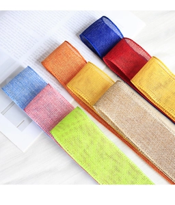 Detailed view of colorful faux burlap ribbons with natural coarse mesh texture