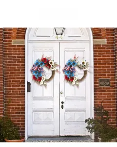 Detail of faux sunflowers and star-spangled ribbons on rustic vine holiday wreaths