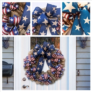 Patriotic burlap wreath with American flag ribbons hanging on a white front door