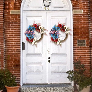 American flag themed patriotic wreaths with red white and blue flowers on white doors
