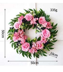 Detail of 50cm eucalyptus wreath with pink roses, hydrangea clusters and purple berries