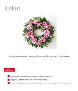 Detail of a 50cm pink rose and eucalyptus wreath showing realistic fabric and berry textures