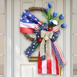Detailed Patriotic wreath with blue tulips and flag bow on a white wooden door