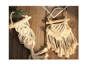 Detailed macro view of handmade macrame wall hangings with cotton rope and tassels