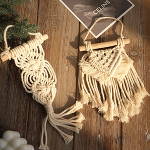 Bohemian handmade macrame wall hanging with cotton tassels and natural wooden rod