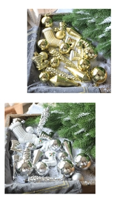 Close-up of assorted gold and silver Christmas ornaments with star and boot shapes
