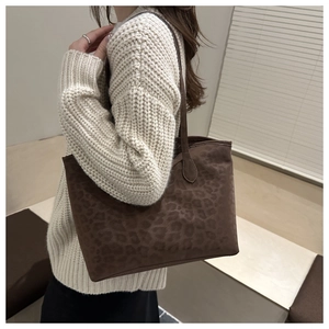 Leopard print tote bag detail showing soft suede texture and large capacity for commuting