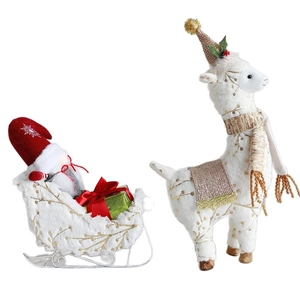 Christmas plush reindeer and santa claus in sleigh tabletop holiday decoration