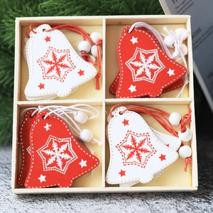 12pcs Christmas wooden bell ornaments with snowflake patterns in a 4-grid storage box