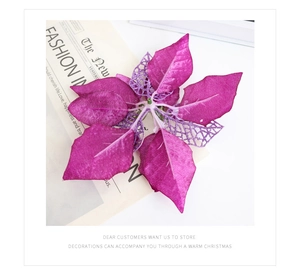 Dettaglio macro di stella di Natale viola con glitter e petali a rete per decorazioni