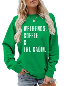 Detail of green crewneck sweatshirt with vintage Weekends Coffee The Cabin white lettering