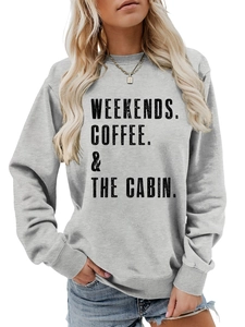 Detail of grey crewneck sweatshirt with WEEKENDS COFFEE THE CABIN print and ribbed cuffs