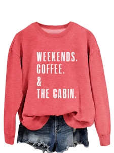 Detail of red crewneck sweatshirt featuring white vintage Weekends Coffee The Cabin print