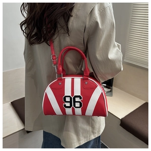 Detail showing the red and white American style shoulder bag with 96 embroidery