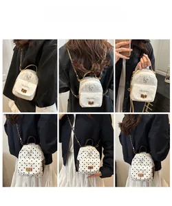 Polka dot mini backpack with chain strap shown in various stylish carrying styles