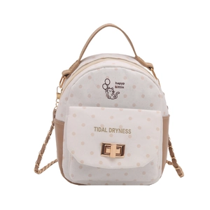 Polka dot backpack for women featuring cute cartoon cat print and gold chain strap