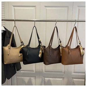 Four minimalist faux leather tote bags in apricot, black, brown and tan with silk scarves