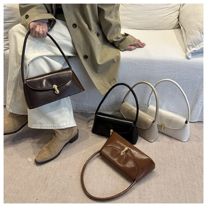 Collection of retro leather underarm bags with vintage gold buckles in five classic colors