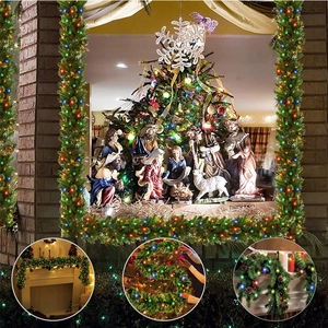 2.7m Green PVC Christmas garland with colorful LED lights for festive window decoration