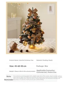 Close-up of 45cm snowy Christmas tree with gold ornaments, pine cones and wooden base