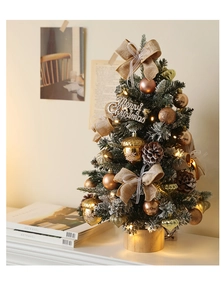 Detail of 45cm mini snowy Christmas tree with warm LED lights and burlap bow decor