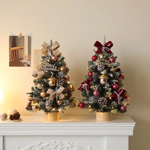 Tabletop 45cm Christmas tree with LED lights and gold pinecones on a wooden base