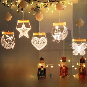 Détail de rideau lumineux LED blanc chaud avec formes de lune, étoile et cœur