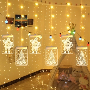 Détail des lumières LED de Noël blanc chaud avec panneaux acryliques Père Noël et sapin