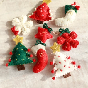 Handmade wool felt Christmas ornaments set including trees and stars for festive decoration