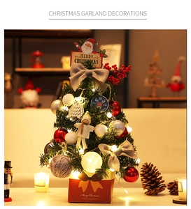Mini tabletop Christmas tree with red silver balls, burlap bows and warm LED lights