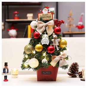Detailed tabletop Christmas tree with red gift box base, owl charms and gold ornaments