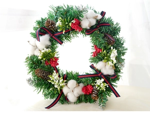 Detailed Christmas wreath featuring artificial pine needles, cotton balls, and red berries