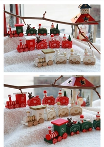 Detailed view of wooden Christmas train set with festive snowmen and bear characters