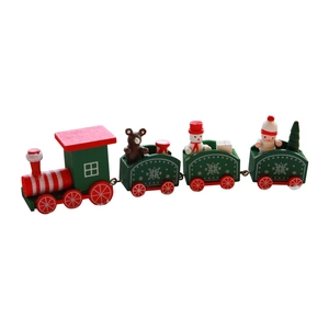Wooden Christmas train centerpiece with festive figurines and white snowflake patterns
