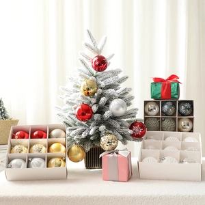 Christmas ball ornament set with glitter and painted patterns in a white gift box