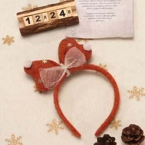 Christmas orange felt bow headband with golden snowflakes and white pom-poms for holidays
