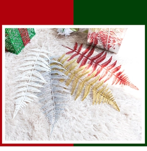 Glittery faux iron leaves in gold, silver, red and white for Christmas tree decor