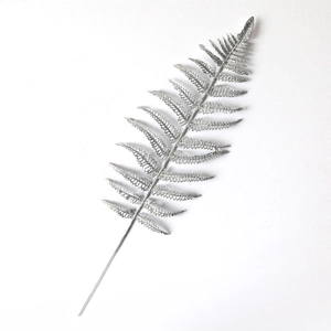 Sparkling silver glitter fern leaves for Christmas tree decoration and festive arrangements