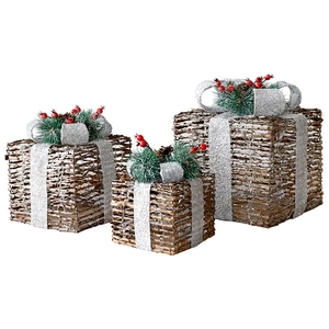 Three-piece set of brown rattan Christmas gift boxes with silver bows and red berries