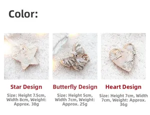 Rustic wood star heart and butterfly ornaments on white fur background with warm lights