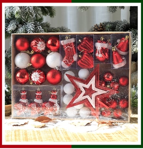Detailed set of red and white Christmas ornaments including stars and balls in festive box
