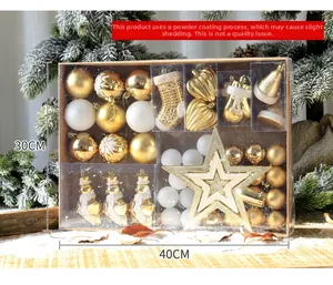 Detailed set of gold and white Christmas ornaments with glitter stars and tree baubles